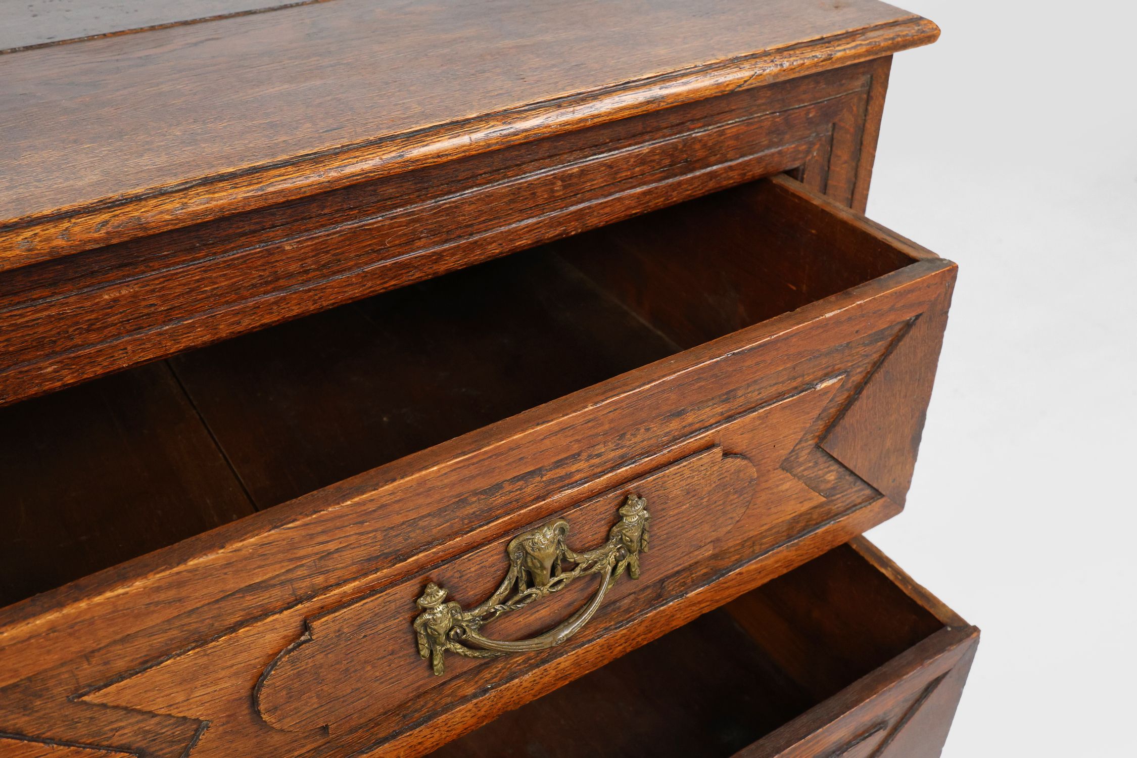 Antique hand crafted en carved chest of drawers in oak, ca. 1800 thumbnail